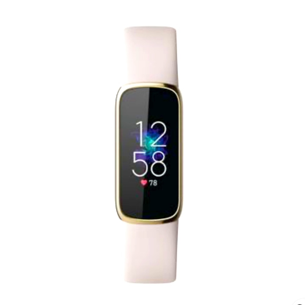 Fitbit luxe activity tracker. Soft white band.